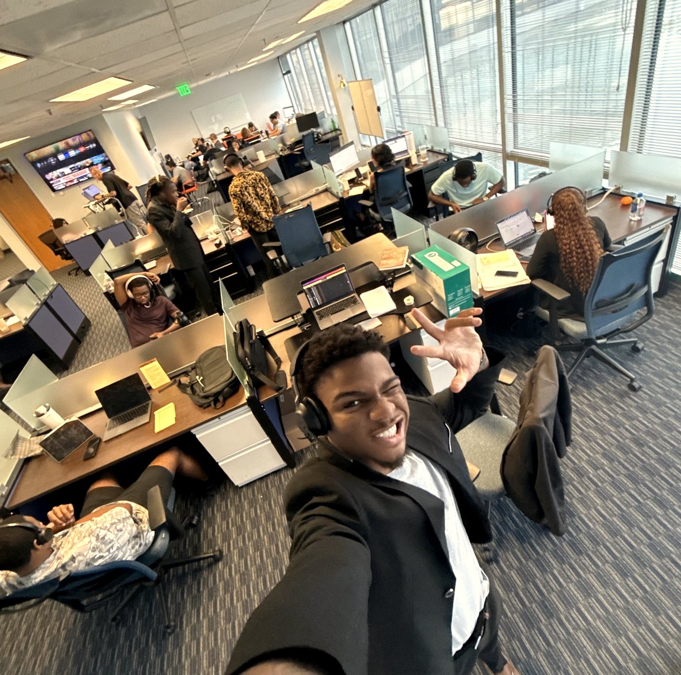 Eterna agents on headsets taking live inbound calls on the floor